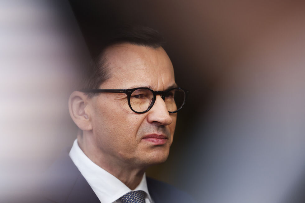 Polens statsminister Mateusz Morawiecki vil holde folkeavstemning og spørre polakkene om de vil ha åpne Polen for tusener av ulovlige innvandrere fra Midtøsten og Afrika.
 Foto: AP Photo/Geert Vanden Wijngaert/NTB