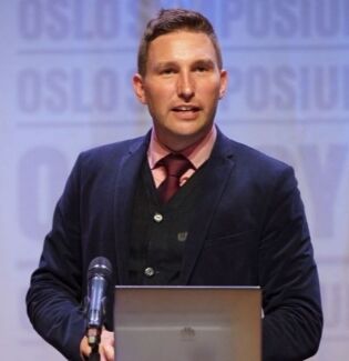 Truls Olufsen-Mehus talte på Oslo Symposium i august.
 Foto: Enis Uzunov