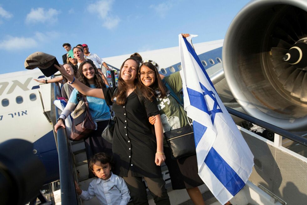 En gruppe nye immigranter fra Nord-Amerika ankommer Israel.
 Foto: Hillel Maeir/TPS