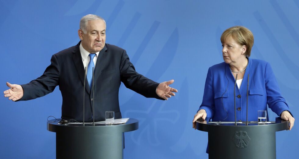 Statsminister Benjamin Netanyahu og forbundskansler Angela Merkel under et tidligere møte. En uttalelse fra en offisiell kilde sier at Tyskland ikke vil sette sanksjoner mot Israel om de vår videre med planene om å hevde suverenitet over Vestbredden.
Foto: Michael Sohn/NTB Scanpix