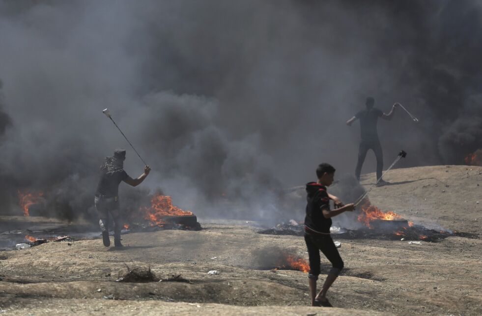 Fra opptøyene ved Gaza-grensen denne våren.
 Foto: AP / NTB Scanpix