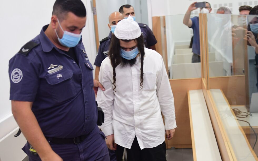 Amiram Ben-Uliel fikk tre livstidsdommer i retten i Lod. Han opplyser at han vil anke dommen.
 Foto: Avshalom Sassoni / NTB Scanpix