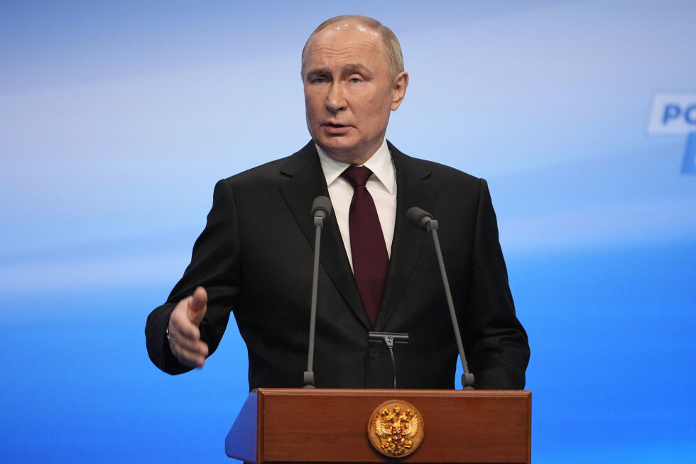 President Vladimir Putin på talerstolen da han holdt sin seierstale søndag kveld.
 Foto: Aleksander Zemlianitsjenko / AP / NTB