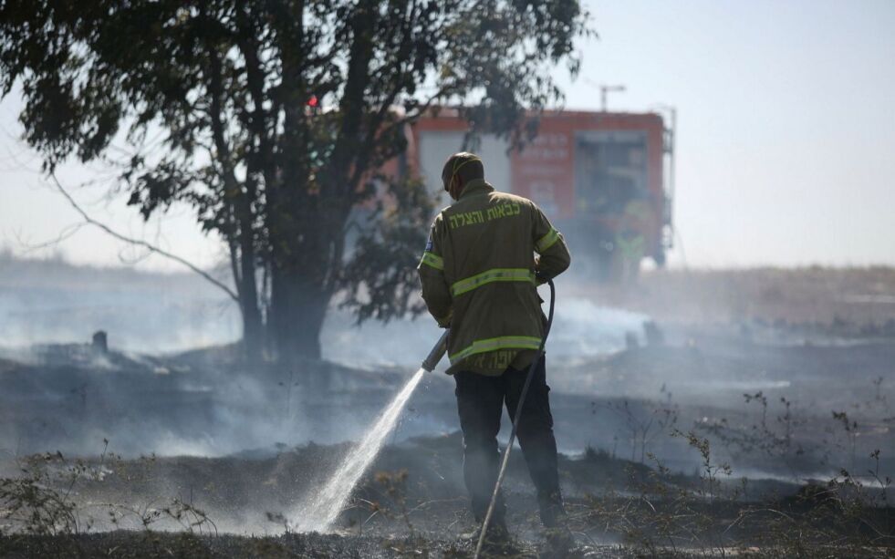 Slokking av ballongbrann utenfor kibbutzen Saad i Israel. Arkivbilde.
 Foto: Hillel Maeir/TPS