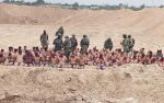 Videoer og bilder viser titalls av palestinske terrorister overgi seg