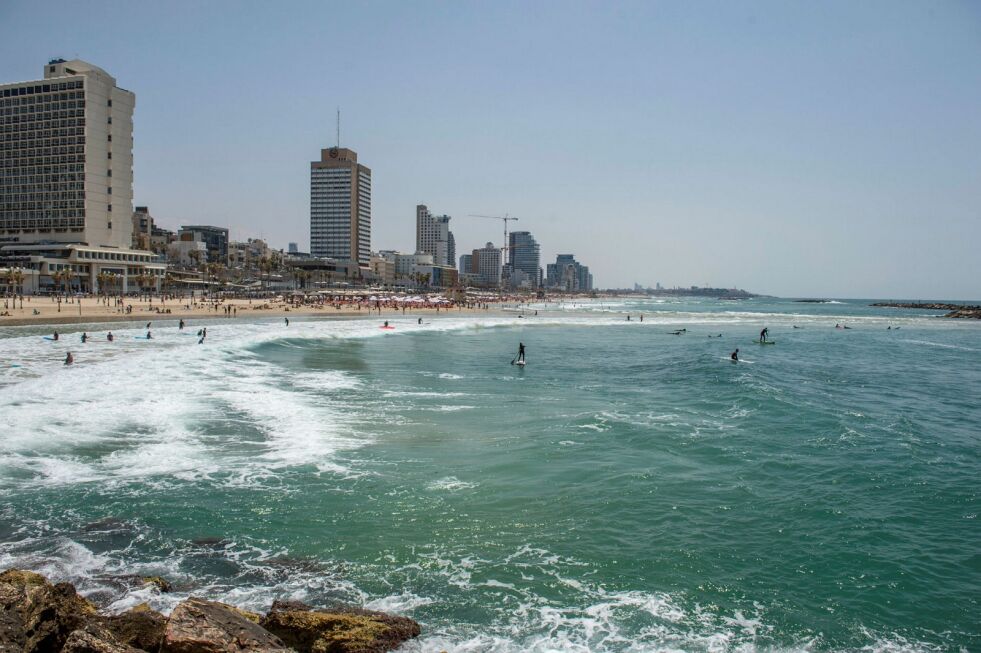Turister på stranden i Tel Aviv.
 Foto: Kobi Richter/TPS