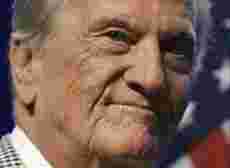 Pat Boone selger land i Galilea til kristne